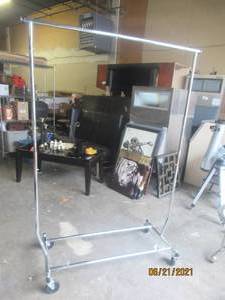 lot 16 image: STEEL  CLOTHING RACK ON WHEELS