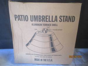 lot 115 image: PATIO UMBRELLA STAND BASE  S-32 ALUMINUM TERRACE  SHELL  SZG17H1