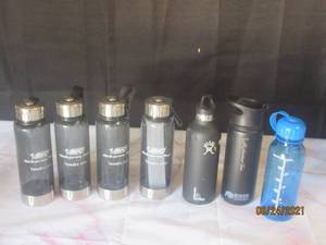 lot 134 image: TOTAL OF 7 WATTER BOTTLES