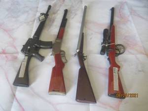 lot 182 image: SET OF 4 RIFLE LIGHTER
