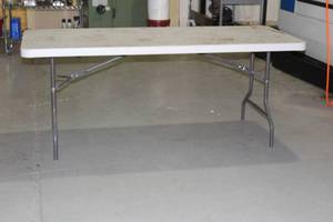 lot 11 image: OFFICE DEPOT 6FT LONG FOLDING TABLE