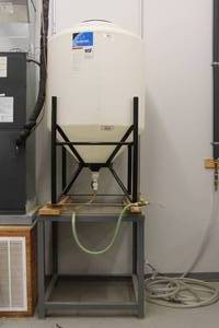 lot 215 image: ACE ROTO MOLD 150 GAL WHITE CONE BOTTOM&nbsp FERMENTER TANK WITH HOSE CB00150SWSS AND&nbsp STAND&nbsp