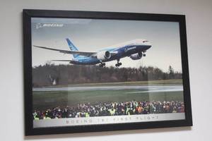 lot 144 image: BOEING 787 FLIGHT PICTURE POSTER IN BLACK WOOD&nbsp FRAME , 39 X 27