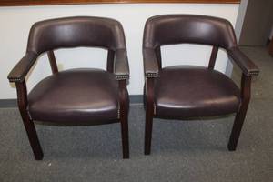 lot 276 image: TOTAL OF 2 BURGUNDY LEATHER ARM OFFICE CHAIRS WITH NAILHEAD TRIM &amp WOODEN LEGS&nbsp