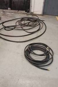lot 431 image: 2 WATER HOSES 25FT PLUS AND 10 TO 15FT