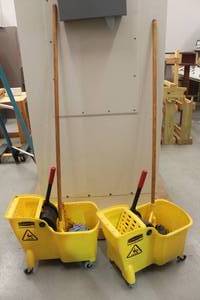 lot 434 image: 2 RUBBERMAID COMMERCIAL MOP BUCKETSWRINGERS AND MOPS