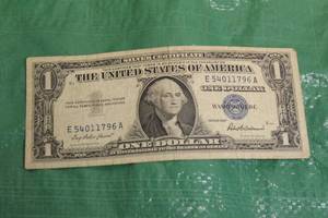 lot 27 image: ONE DOLLAR ($1) SERIES 1957 SILVER CERTIFICATE BLUE SEAL U.S. BANKNOTE&nbsp