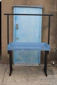 lot 84 image: LUANDRY FOLDING TABLE WITH HANGING BAR 48X24