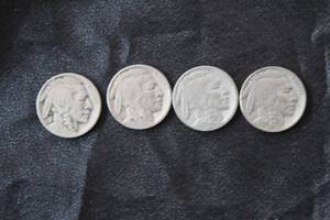 lot 127 image: LOT OF 4 INDIAN HEAD BUFFALO NICKLES 1927,1928 AND 1929