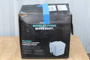 lot 68 image: DOMETIC MOBILE LIVING 960 SERIES 5 GAL CAPACITY PORTABLE TOILET