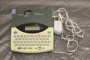 lot 13 image: BROTHER P-TOUCH PT-18001810 LABEL MAKER&nbsp