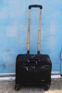 lot 41 image: SAMSONITE ROLLING LUGGAGE , 16H X 17