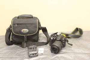 lot 152 image: NIKON DIGITAL CAMERA D3100 WITH NIKON DXSWM VR LENSE ,BATTERY &amp CHARGER AND CARRY BAG ,