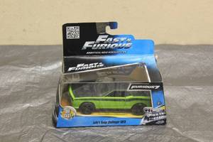 lot 174 image: JADA FAST &amp FURIOUS 7 LETTYS DODGE CHALLENGER SRT8 DIE CAST # 24037 IN ORIGINAL BOX