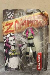 lot 197 image: MATTEL WWE ZOMBIE SASHA BANKS FIGURINE DXG71 IN ORIGINAL BOX&nbsp