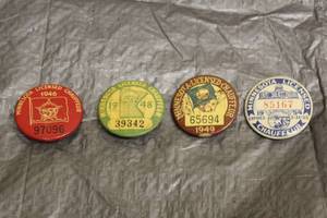 lot 19 image: TOTAL OF 4 VINTAGE STATE OF MINNESOTA LICENSED CHAUFFEUR BADGES&nbsp 1946-1954