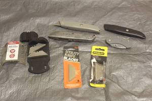 lot 110 image: TOTAL OF 4 BOX CUTTERS WITH LOT OF UTILITY BLADES&nbsp
