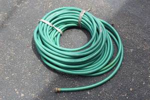 lot 68 image: WATER HOSE ABOUT 25 TO 30FT LONG