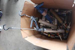 lot 74 image: LOT OF CAULK GUNS AND TUBES OF SEALANT AND ADHESIVES SEE PICS