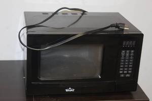 lot 99 image: WALMART RIVAL MICROWAVE OVEN KOR-9G3A