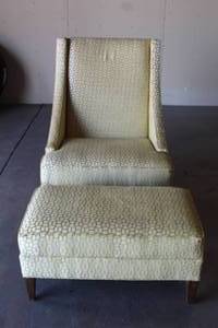 lot 16 image: UPHOLSTERED SLEEK WING CHAIR WITH OTTOMAN