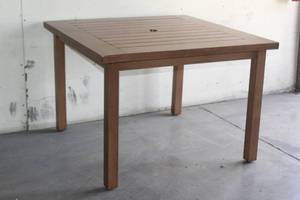 lot 73 image: METAL PATIO TABLE WITH UMBRELLA INSERT 43X43X30 TALL