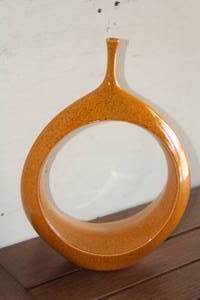 lot 77 image: GLOBAL VIEWS OPEN OVAL RING VASE DECOR 16 TALL