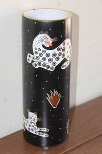 lot 86 image: WAYLANDE GREGORY TALL CYLINDER VASE WITH LEOPARDS MATTE BLACK&nbsp