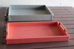 lot 155 image: TOTAL OF 2 DECORATIVE SERVING TRAYS WITH HANDLES , TAHARI ( ORANGE 19L ) GLOBAL VIEWS ( GREY 18L )&nbsp
