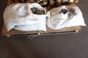 lot 188 image: TOTAL OF 3 LARGE SACKS OF GENEROUS AMOUNT ASSORTED SIZE GREY MEXICAN BEACH PEBBLES&nbsp