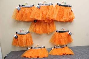 lot 179 image: TOTAL OF 8 ORANGE HALLOWEEN TUTU SKIRTS 2T-4T