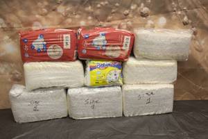 lot 54 image: LOT OF NEW DIAPERS SIZE NEWBORN 1 AND 2