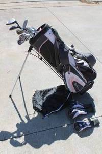 lot 95 image: LADY HAGEN INSPIRE GOLF BAG AND CLUBS BALLS TEES AND A PAIR OF NIKE SIZE 8.5 GOLF SHOES&nbsp