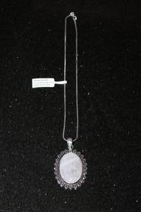 lot 211 image: ROSE QUARTZ PENDANT NECKLACE WITH GERMAN SILVER CHAIN&nbsp