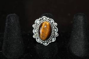 lot 234 image: TIGER EYE GERMAN SILVER RING SIZE 8