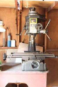 lot 55 image: BUFFALO MACHINE TOOLS HEAVY DUTY COMPLEX DRILLINGMILLING MACHINE MM-1 WITH MANUAL ATTACHED TO DESK INCLUDED