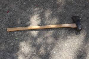 lot 63 image: 33 LONG WOOD HANDLE AXE