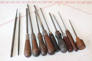 lot 79 image: 11 VINTAGE ROUND WOOD HANDLE FILES VARIOUS SIZES&nbsp