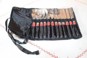 lot 121 image: COLEMAN 12PC RED HANDLE SILVERWARE SET WITH CARRY CASE