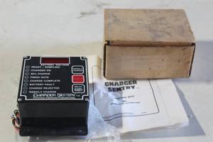 lot 79 image: PERFECTION ELECTRONIC PRODUCTS CHARGER SENTRY 985 WITH MANUAL