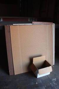 lot 134 image: 13 PEG BOARDS AND PEG BOARD HOOKS