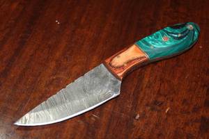 lot 114 image: MHS CUTLERY CUSTUMIZED HANDMADE DAMASCUS STEEL KNIVES WITH EITHER WOOD, BONE OR RESIN HANDLES ALL KNIVES ARE UNIQUELY MADE NO 2 KNIVES ARE THE SAME