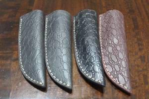 lot 141 image: 4. COWHIDE LEATHER SHEATHS