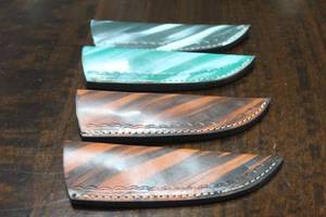 lot 144 image: 4. COWHIDE LEATHER SHEATHS