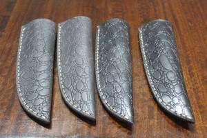 lot 138 image: 4. COWHIDE LEATHER SHEATHS