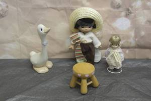 lot 52 image: PRECIOUS MOMENT LOT , INCLUDING 1998 JUAN MEXICAN No 1534, SMALL BABY DOLL , WOOD STOOL AND HONK IF YOU LOVE JESUS GOOSE&nbsp