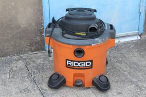 lot 87 image: RIGID 12 GAL SHOP VAC MODEL WD122701