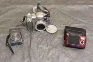 lot 96 image: LOT OF 3 DIGITL CAMERAS CANON AND VIVITAR