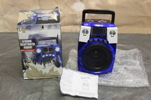 lot 97 image: SUPERSONIC 4 BAND RECHARGEABLE BLUE TOOTH RADIO SC-1390BT