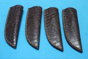 lot 210 image: 4. GENIUNE LEATHER SHEATHS